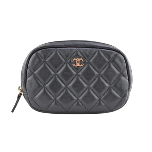 Front view of the Chanel Small Curvy Cosmetic Pouch in black quilted leather with a gold-tone CC emblem.